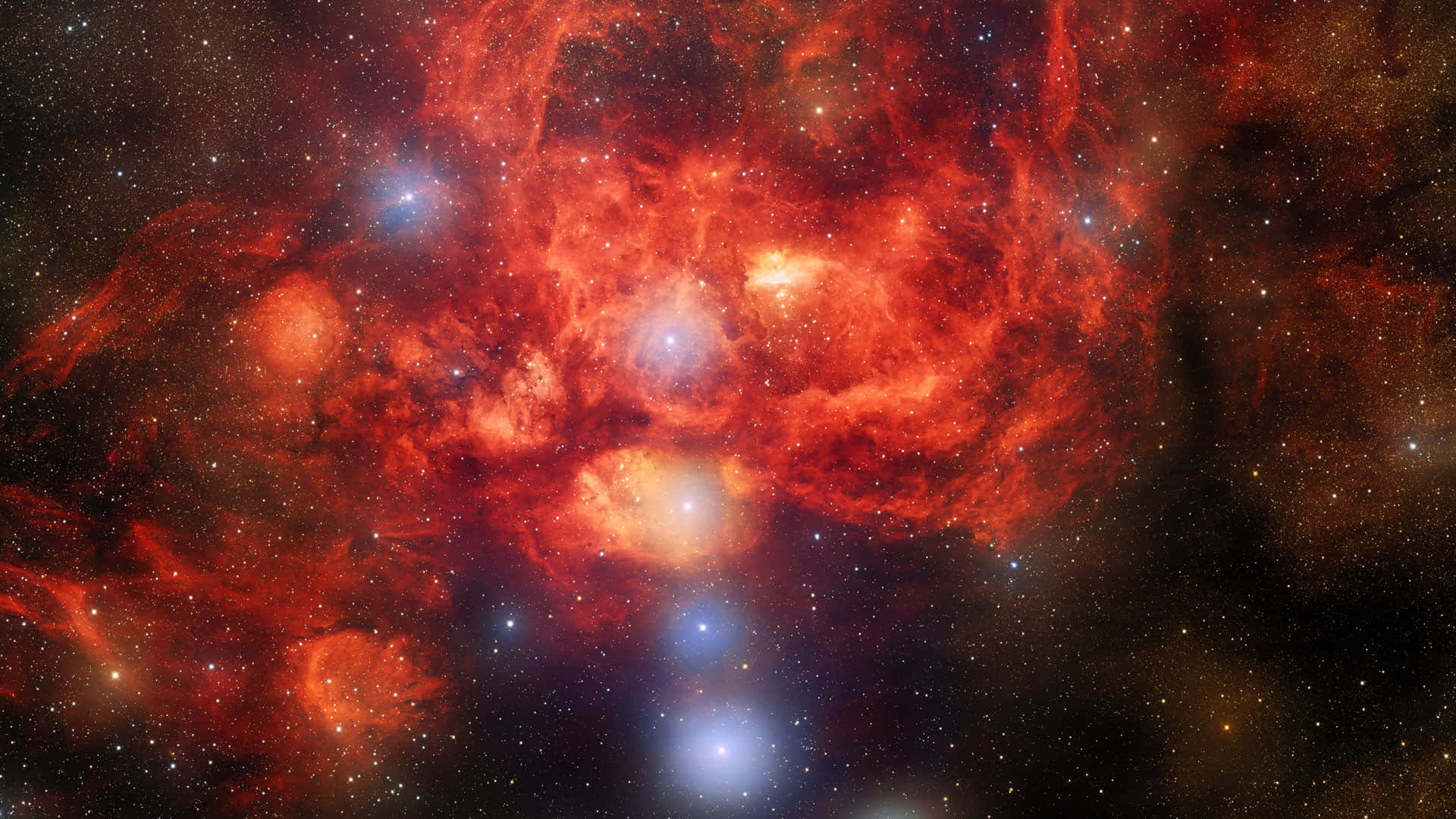 深空中充滿發光星星的熾熱紅色和橙色星雲。