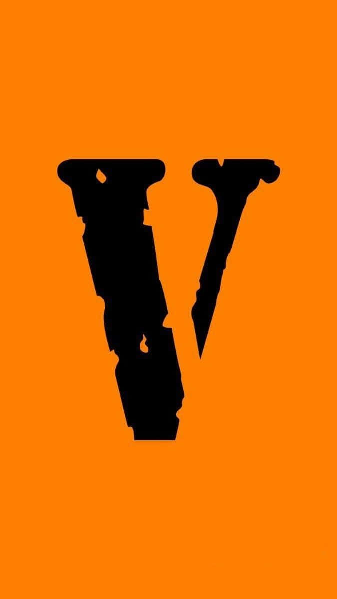 橙色背景上的風格化黑色字母 V