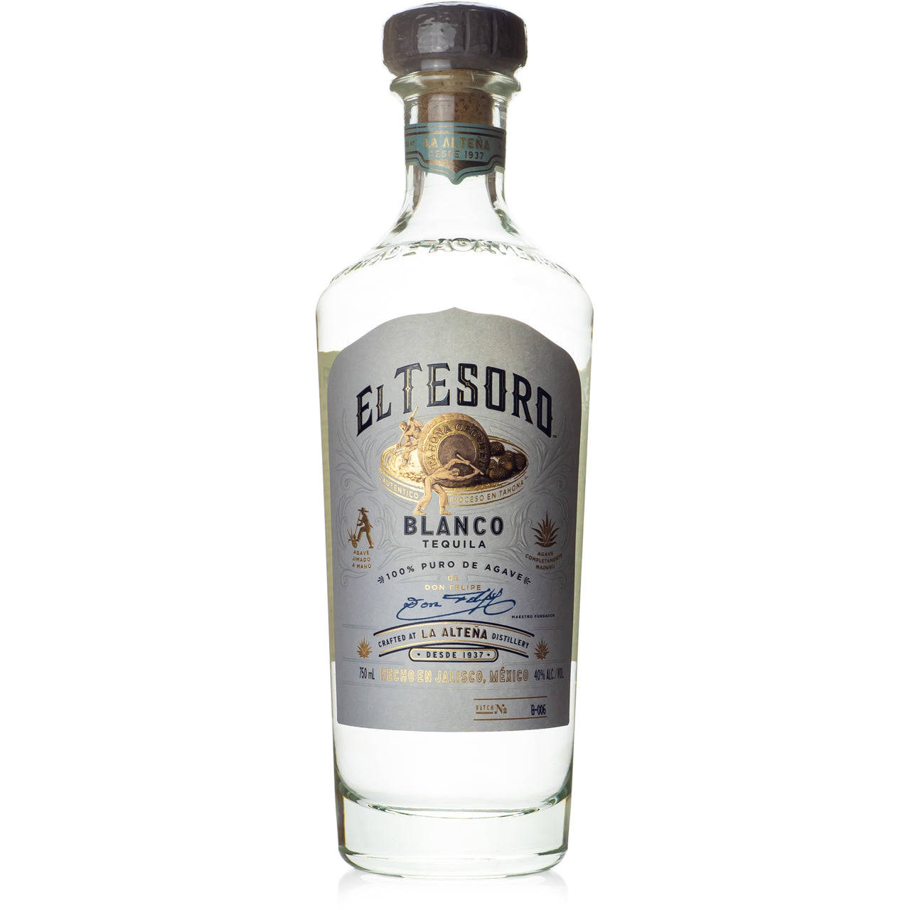 El Tesoro Blanco Tequila 瓶，帶銀色標籤和深色瓶蓋，白色背景