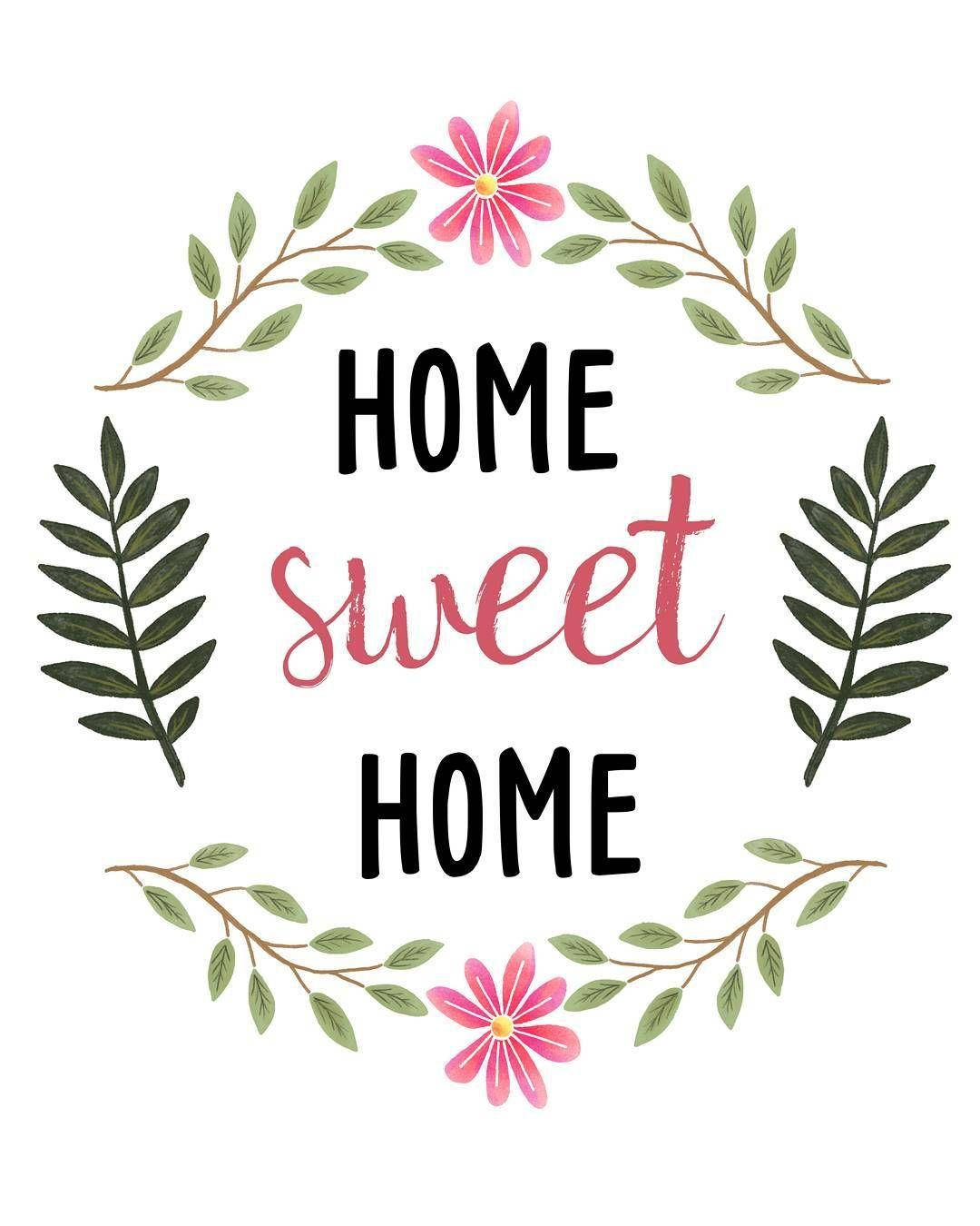 簡約「家是甜蜜的家」標誌 壁紙 — 一個愉快的「home sweet home」文字，以黑色和粉紅色字體書寫，並由綠色樹枝和粉紅色花朵環繞。