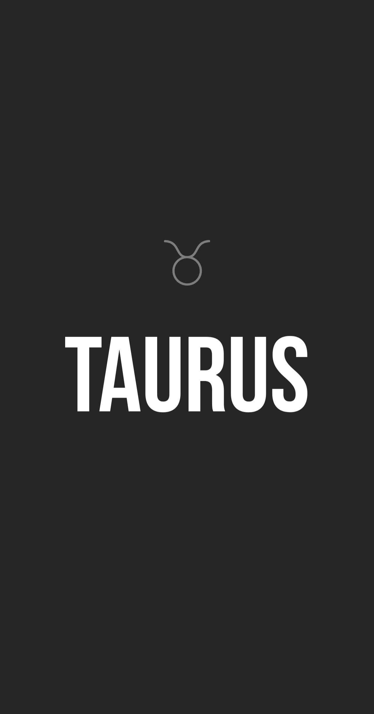 簡約灰調金牛座 壁紙 — 粗體白色文字拼出「Taurus」，並將其星座符號置中於純黑色背景上。