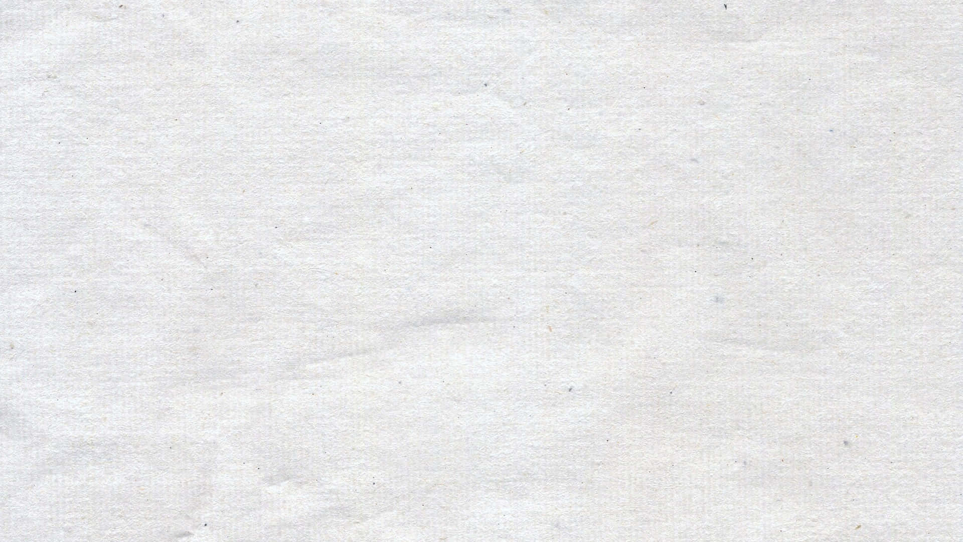帶有柔和摺痕和微弱斑點的白色紋理紙張表面。