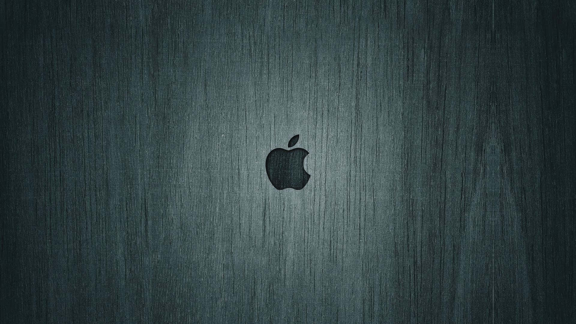 拉絲金屬背景上的Apple標誌