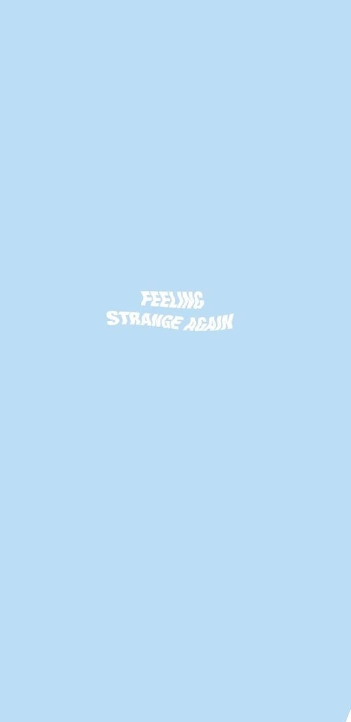 淺藍色背景，白色文字顯示 feeling strange again。