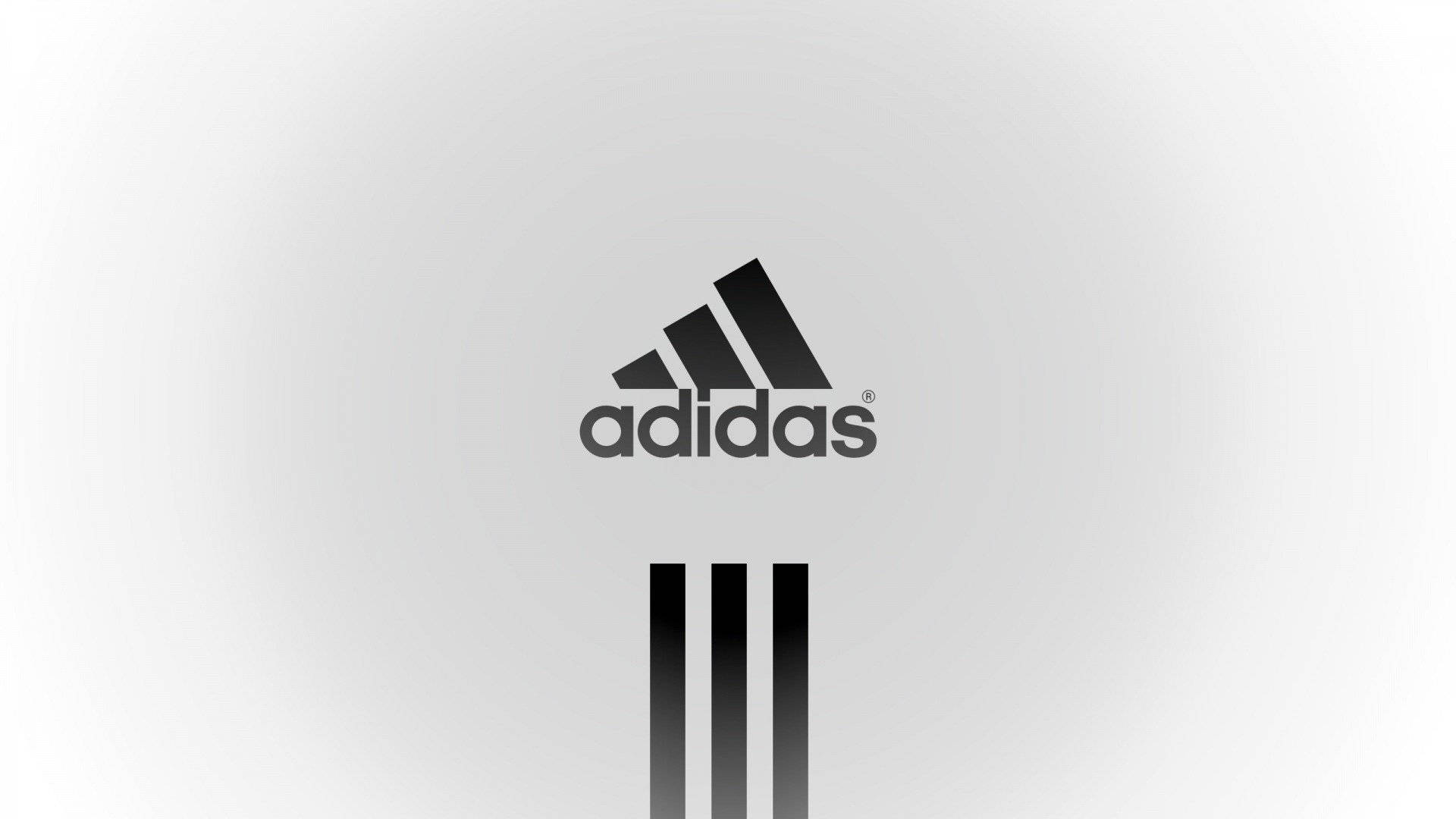 灰色漸變背景上帶有三條紋的adidas標誌