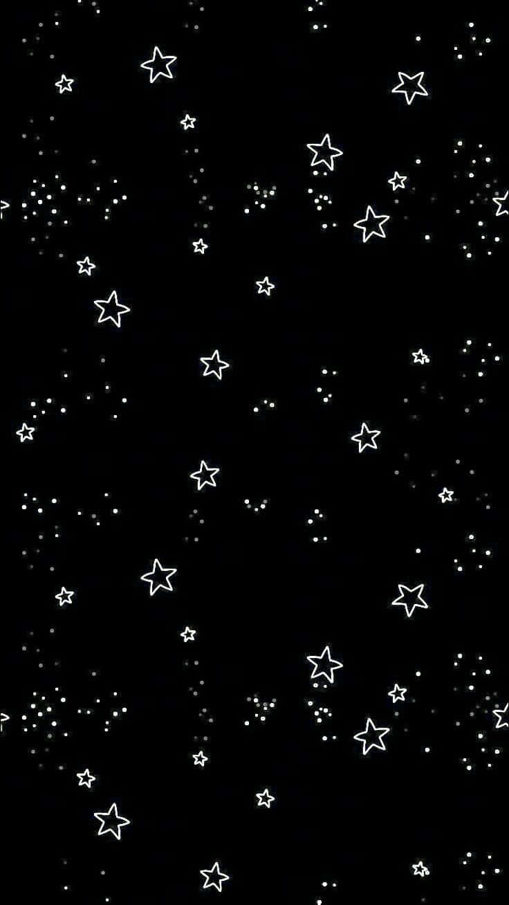黑色背景搭配白色星星和點點，營造宇宙夜空效果。