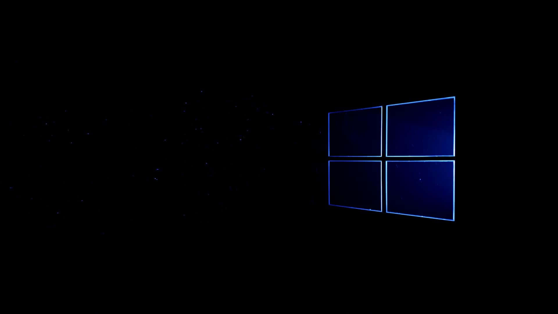 發光的藍色Windows標誌漂浮在星夜中。