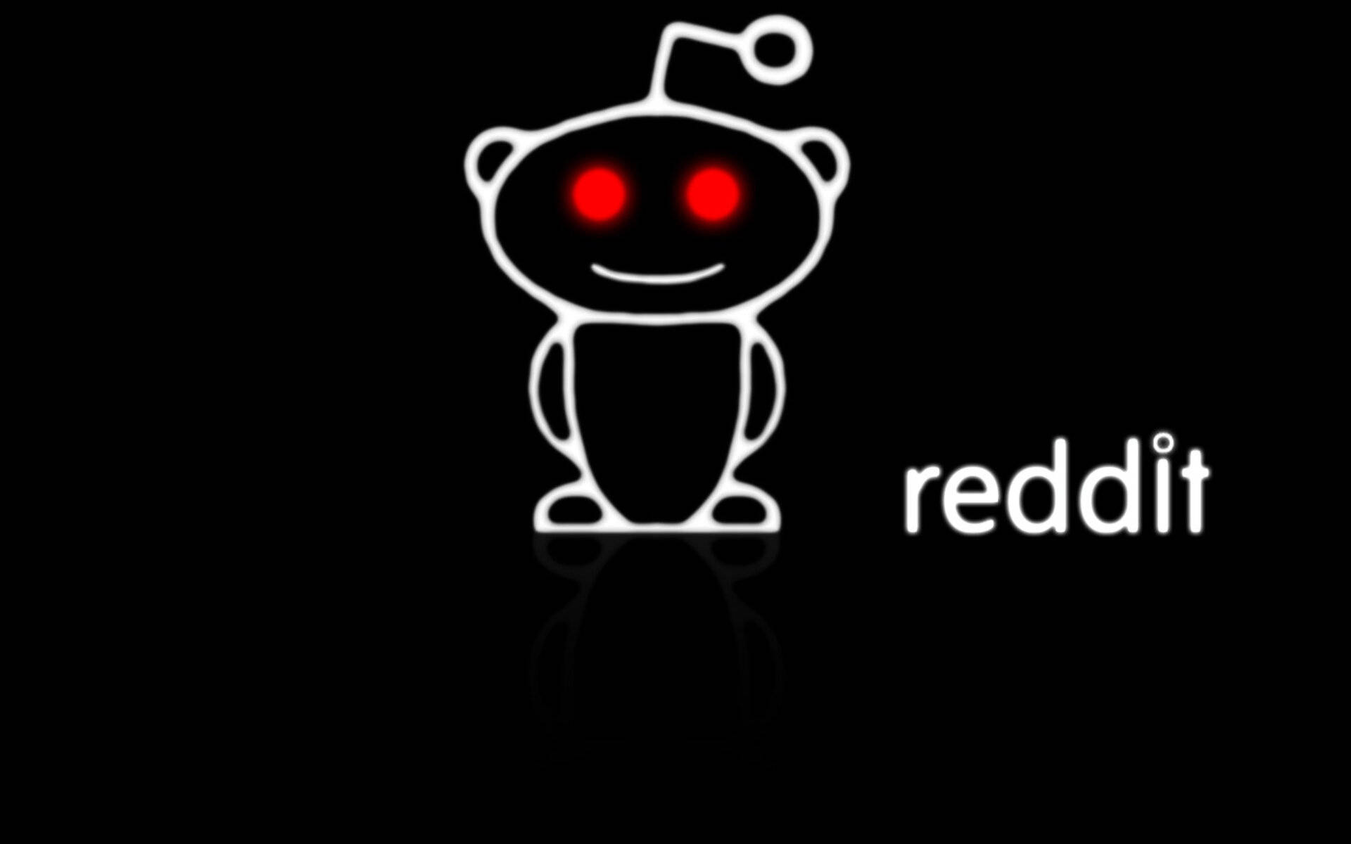 白色 Reddit 外星人標誌，帶紅色眼睛，黑色背景，有反射。