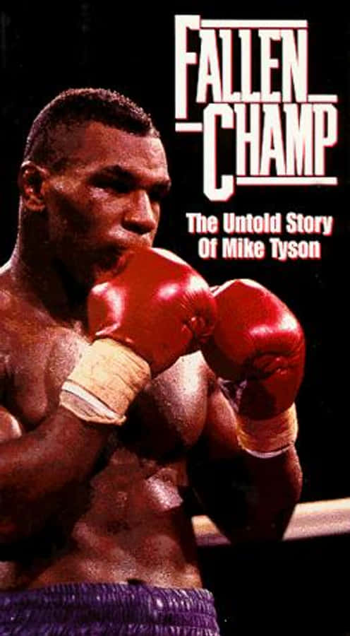 mike tyson 桌布 壁紙 — 米奇泰森戴上紅色拳擊手套，在深色背景下凝視，粗體文字寫著Fallen Champ。