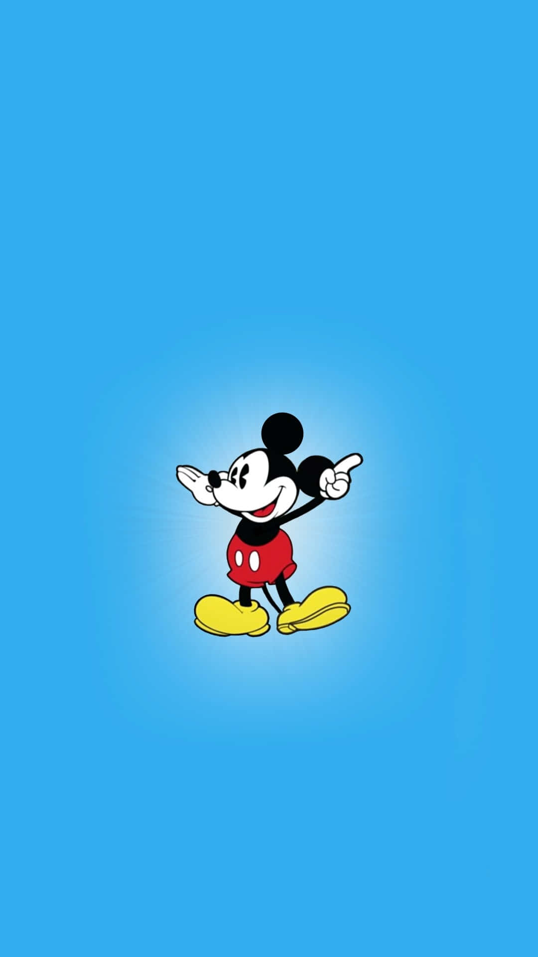 米奇老鼠在藍色背景上開心地指著。