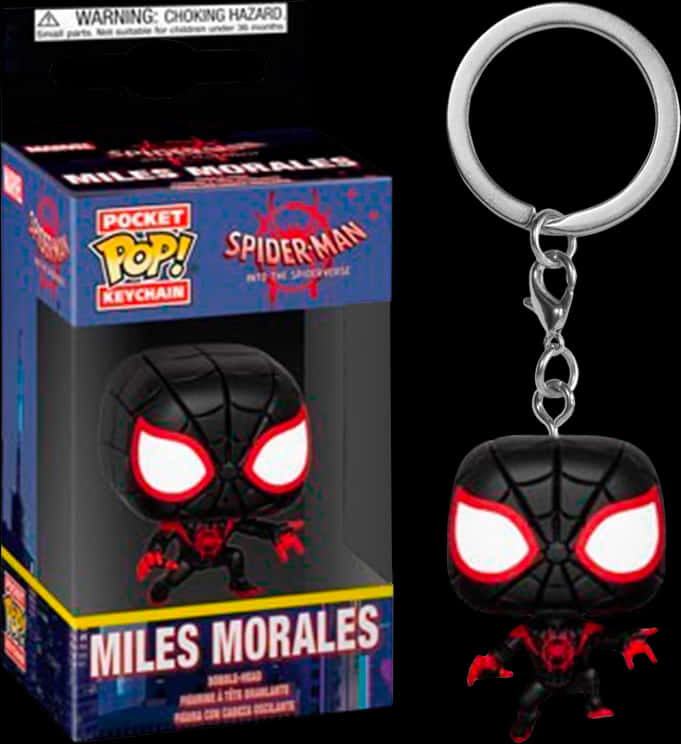 米爾斯·莫拉萊斯蜘蛛人鑰匙圈 壁紙 — 一個黑色和紅色的 Miles Morales Spider-Man Pocket Pop! 鑰匙扣，帶有發光的白色眼睛，展示在其色彩繽紛的包裝旁邊。