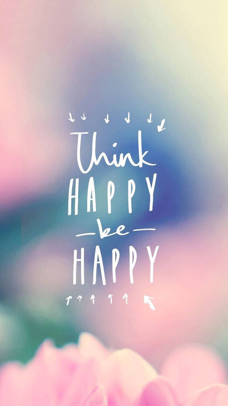 勵志語句「think happy be happy」喺模糊嘅粉紅色花上面。