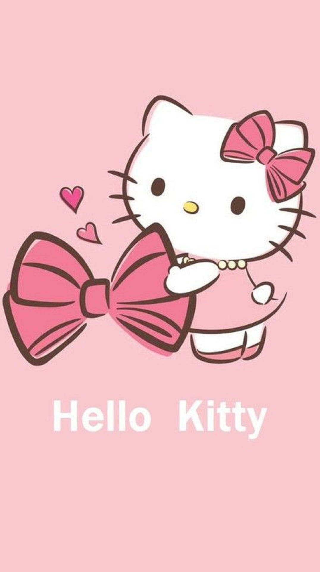 粉紅Hello Kitty手持蝴蝶結 壁紙 — Hello Kitty 卡通角色穿著粉紅色連衣裙，在帶有漂浮心形的柔和粉紅色背景前拿著一個巨大的粉紅色蝴蝶結。