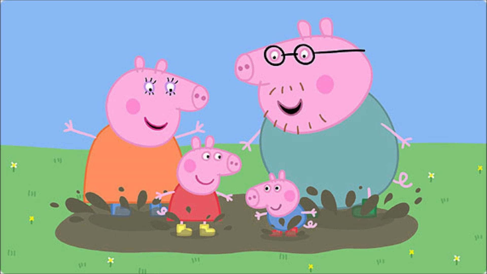 粉紅小豬沐浴陽光 壁紙 — Peppa Pig 一家在晴朗藍天下，於明亮的綠色田野上快樂地濺起泥濘水坑。