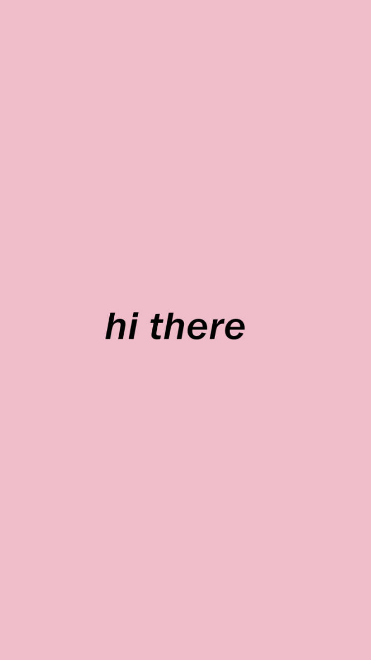 粉紅極簡風格「Hi There」 壁紙 — 極簡粉紅色背景，中央有黑色文字寫著你好。