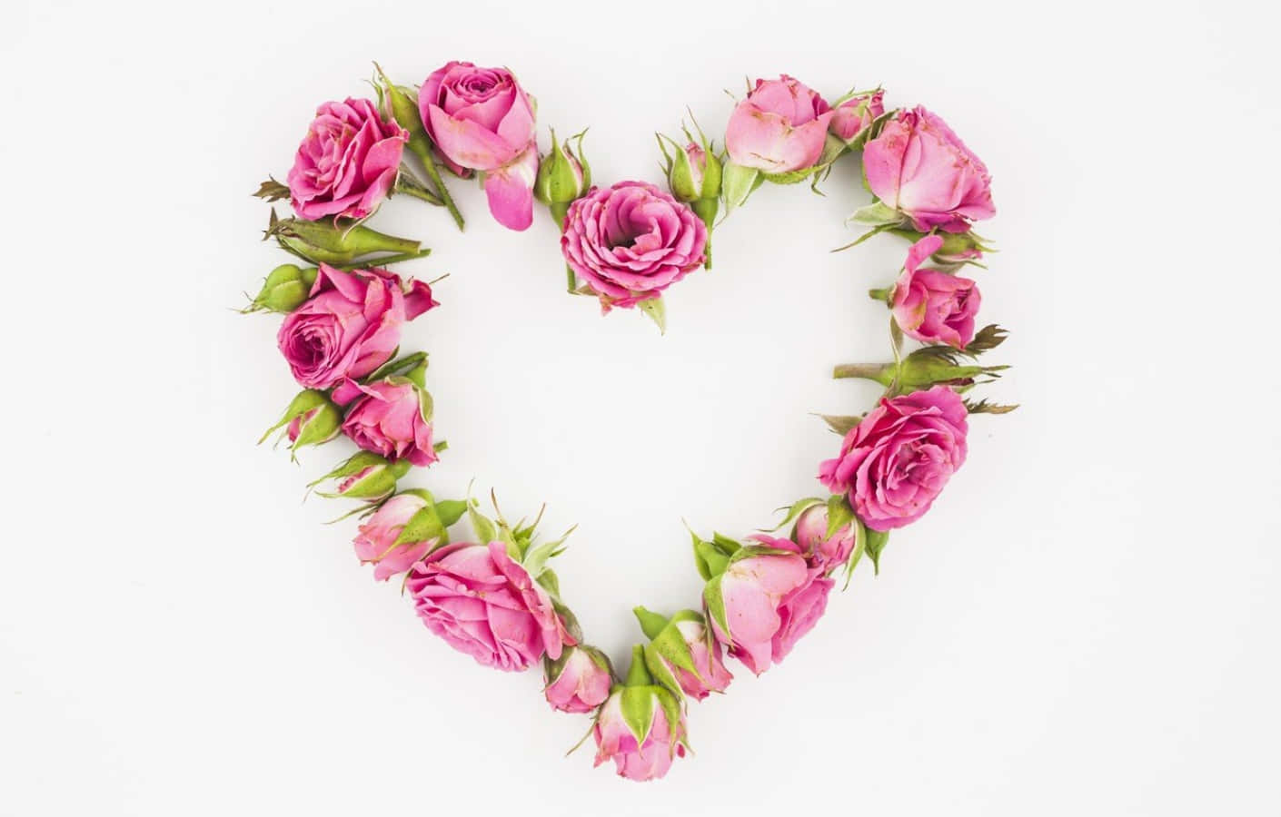 Rose Heart 桌布 壁紙 — 粉紅玫瑰排列成心形，置於潔白背景上。
