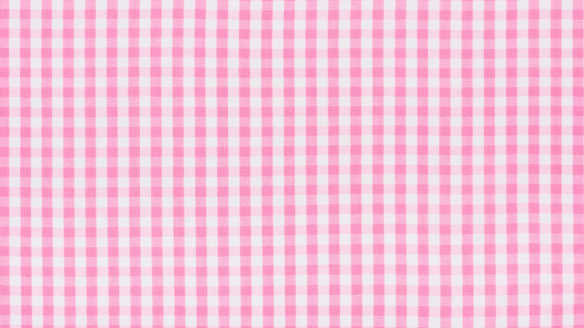 Pink Checkered 桌布 壁紙 — 粉紅與白色格仔布料的近距離特寫，帶有細膩的編織紋理。