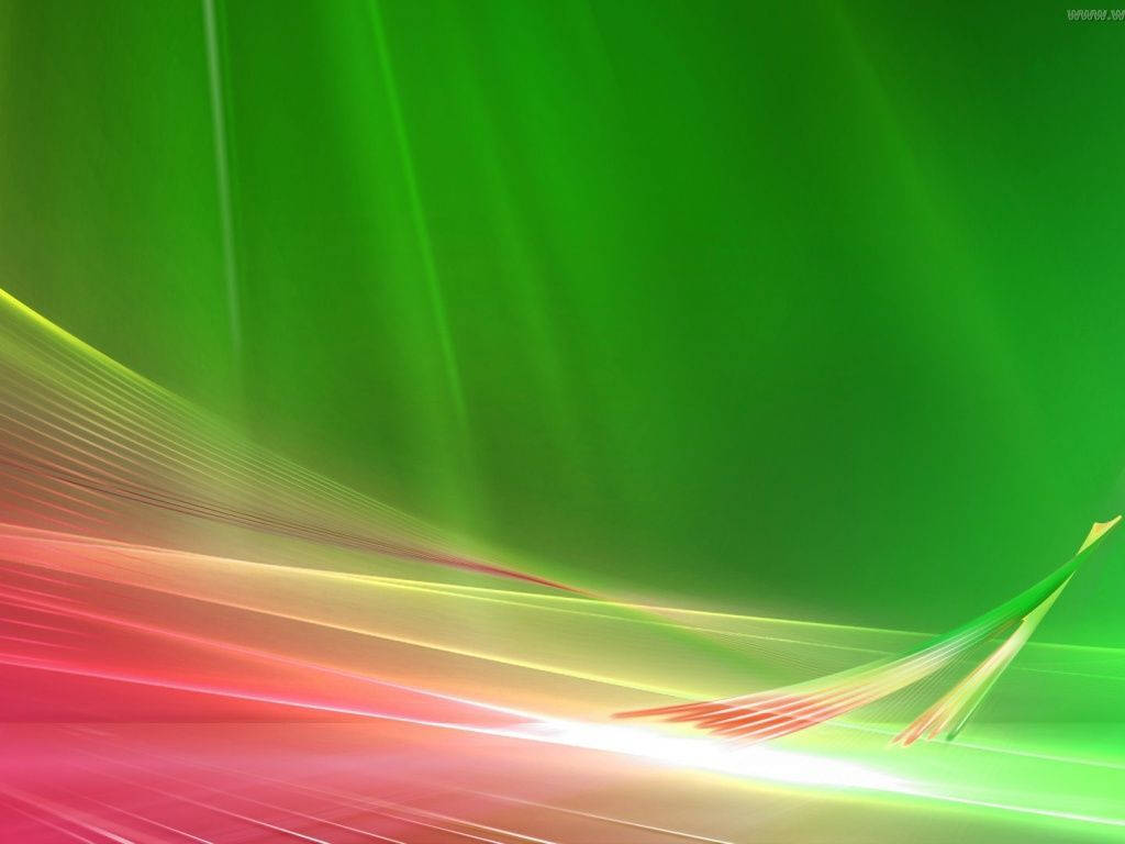 粉紅與綠色 Windows Vista 壁紙 — 充滿活力的綠色和粉紅色光線條紋對角線流過漸變背景，營造出動態的抽象運動效果。