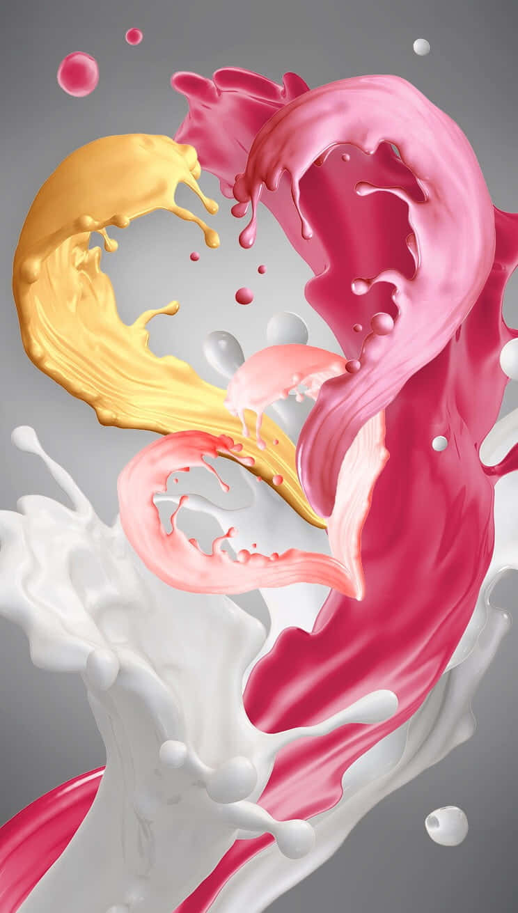 Liquid 桌布 壁紙 — 粉紅色、黃色和白色的液體形態在空中旋轉，形成動態飛濺，背景為中性灰色。