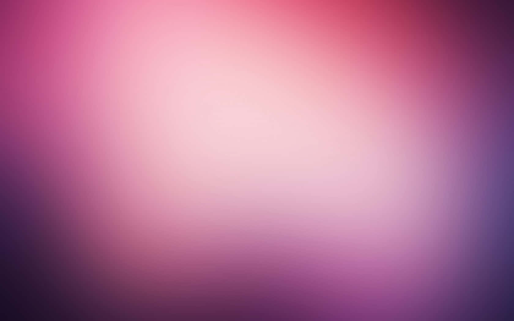 Pink Gradient 桌布 壁紙 — 粉紅色和紫色色調的柔和漸變，融合成夢幻般的抽象背景。