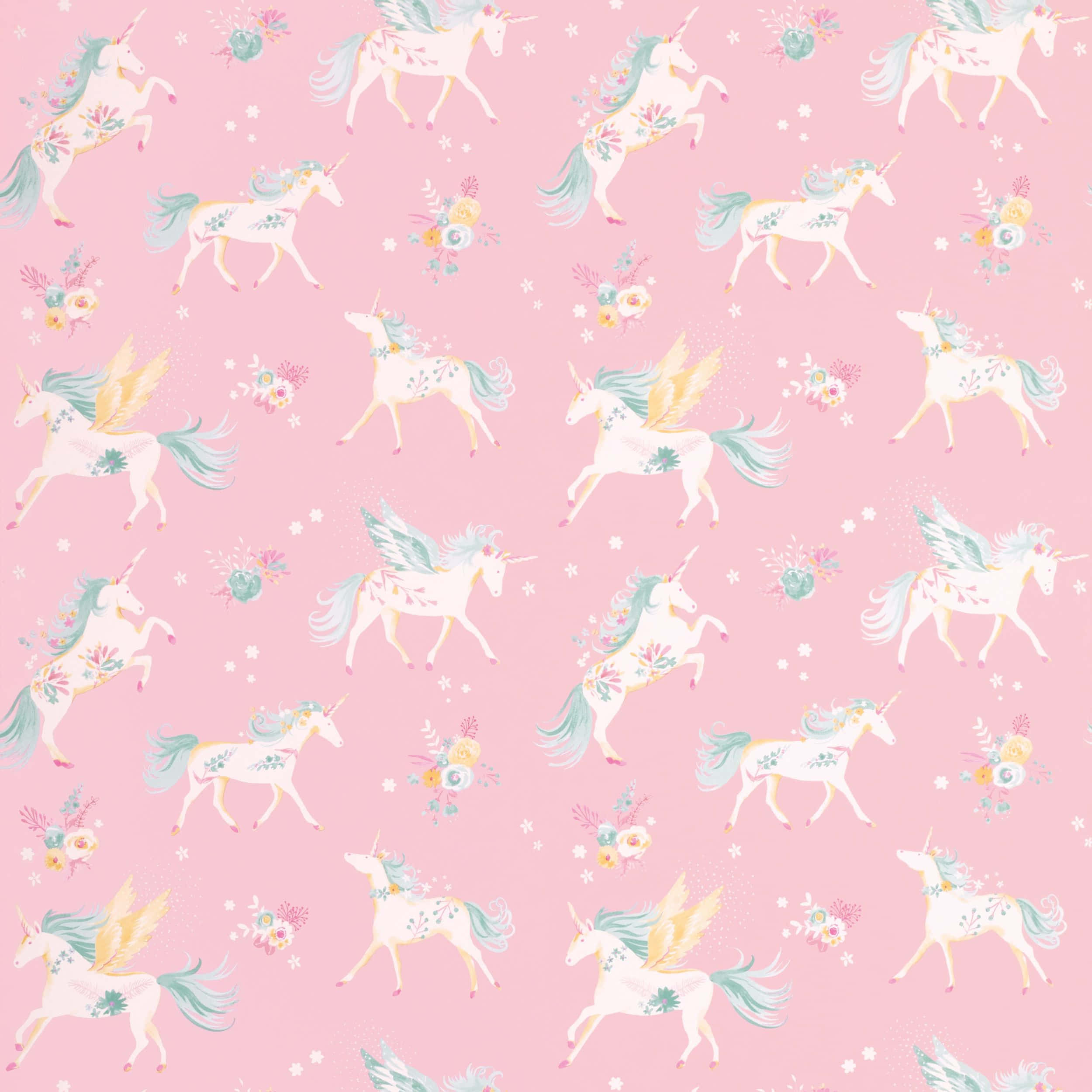Pastel Unicorn 桌布 壁紙 — 粉紅色牆紙，圖案為帶有花冠和翅膀的夢幻獨角獸，襯托柔和粉彩背景。