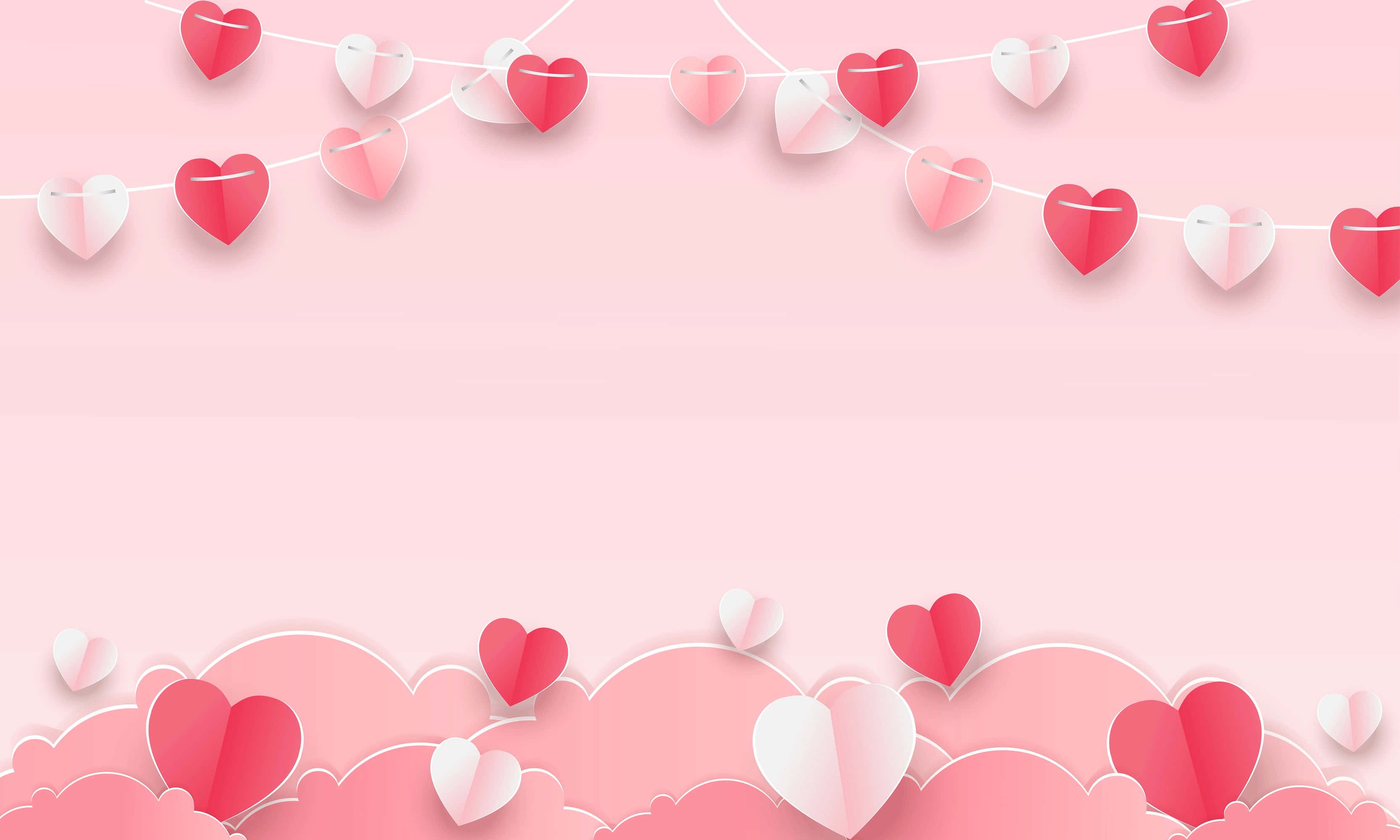 Cute Hearts 桌布 壁紙 — 粉紅色紙心心以繩串起，懸掛在 fluffy 雲朵形狀上方，背景是柔和粉彩粉紅色。