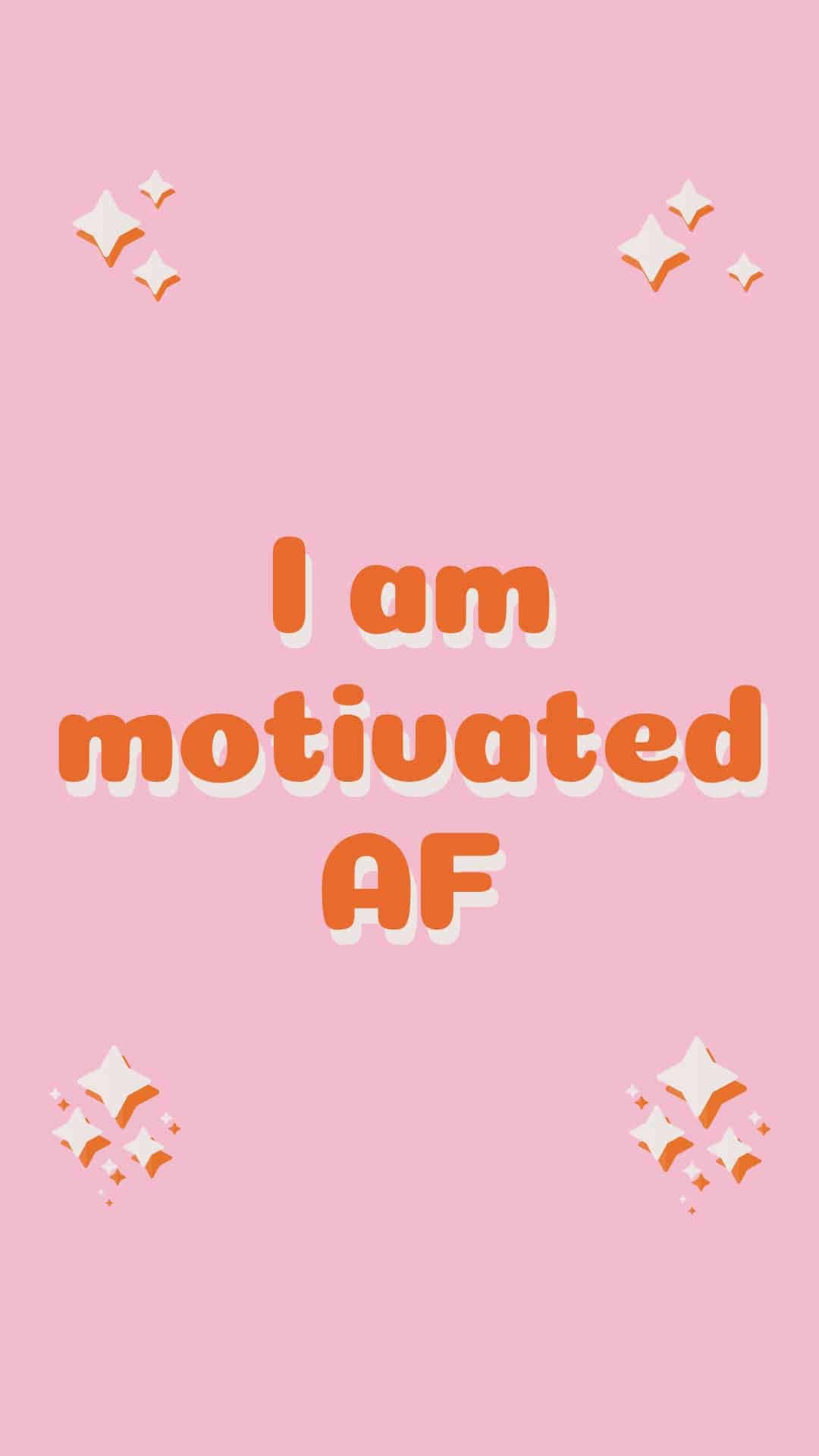 肯定語句 桌布 壁紙 — 粉紅色背景，上面有粗體橙色文字寫著「I am motivated AF」，周圍環繞著白色和橙色的閃光。