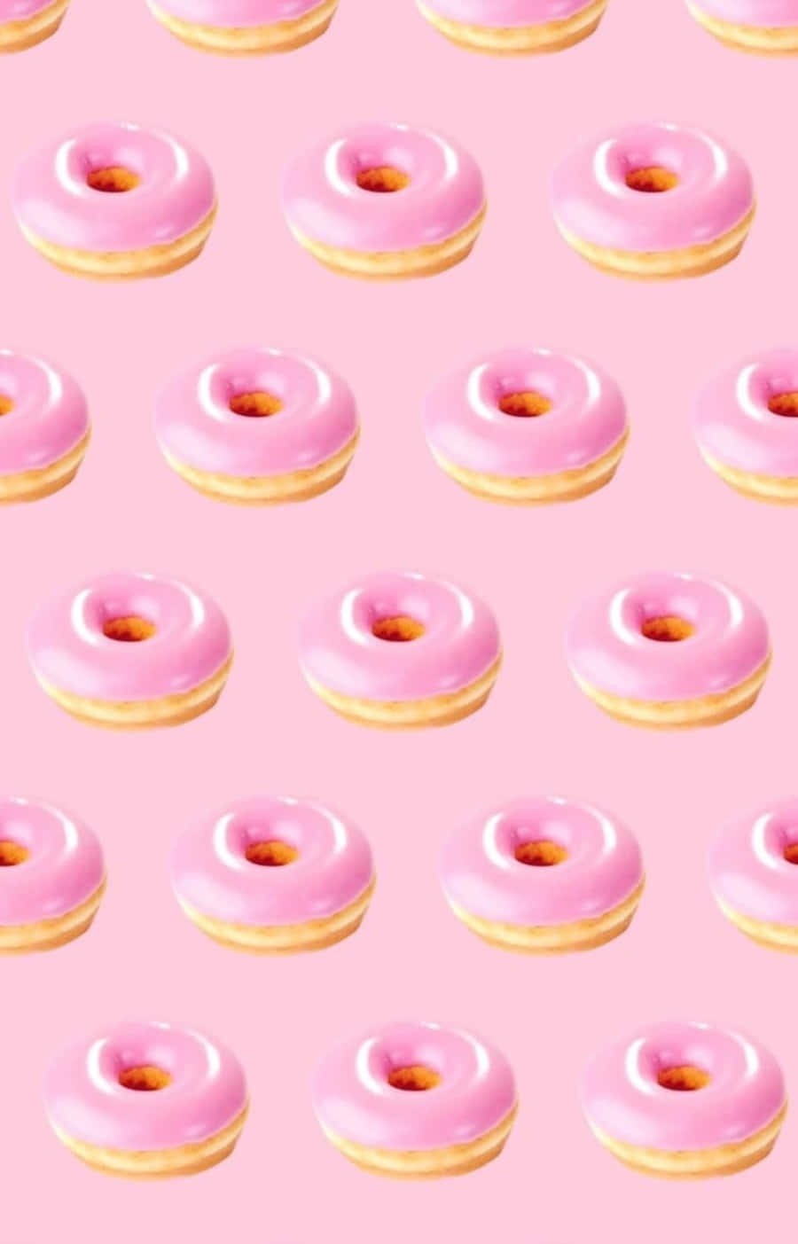 Kawaii Dessert 桌布 壁紙 — 粉紅色釉面冬甩整齊排列在柔和的粉紅色背景上。