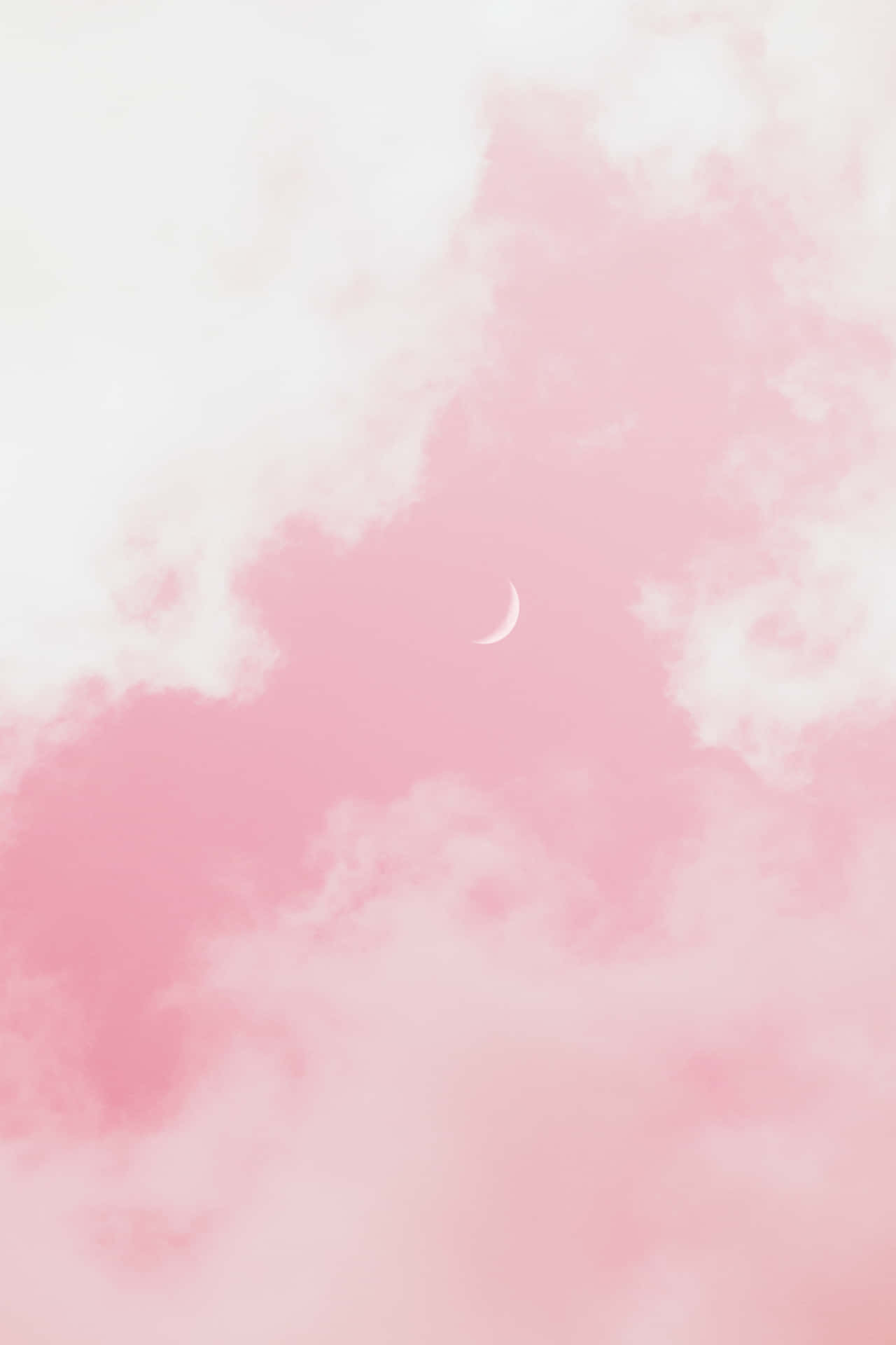 柔和粉紅雲中的新月