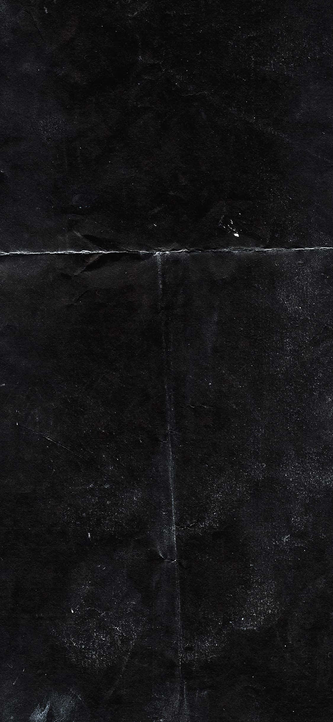 粗糙龐克紋理背景 壁紙 — 深色紋理黑色大理石瓷磚的特寫，帶有細微的灰色紋理和可見的接縫。