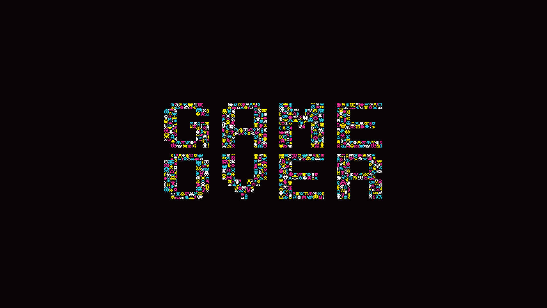 Online Gaming 桌布 壁紙 — 粗體像素化嘅「GAME OVER」文字，用鮮豔彩虹色，襯托純黑色背景。