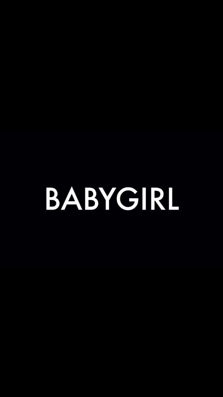 Black Dope Babygirl 壁紙 — 粗體白色文字 BABYGIRL 居中顯示在純黑色背景上。