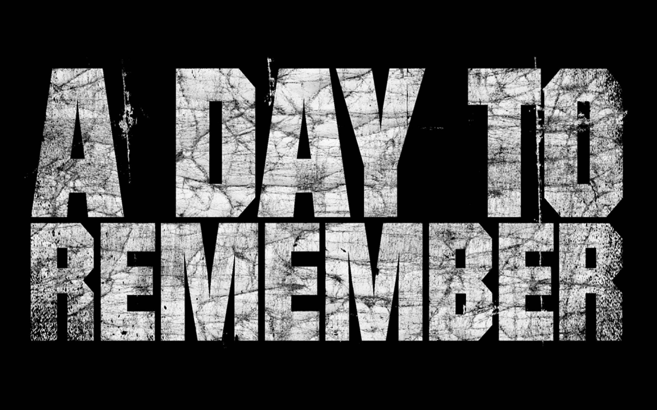 Black Day 桌布 壁紙 — 粗體白色裂紋文字在鮮明的黑色背景上寫著「A DAY TO REMEMBER」。