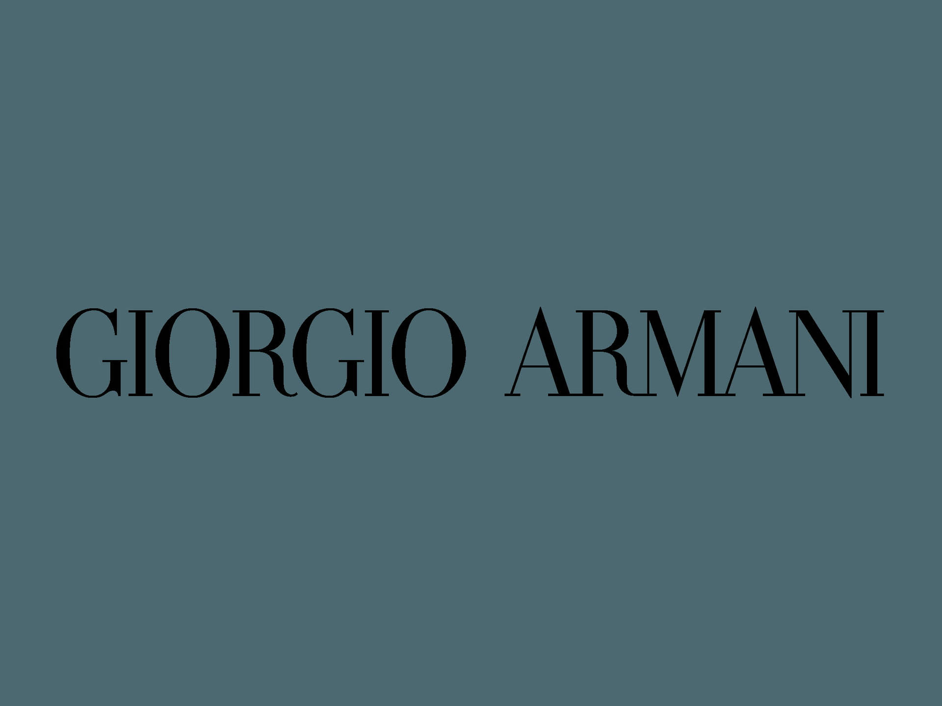 Giorgio Armani品牌標誌以黑色文字顯示在青色背景上。