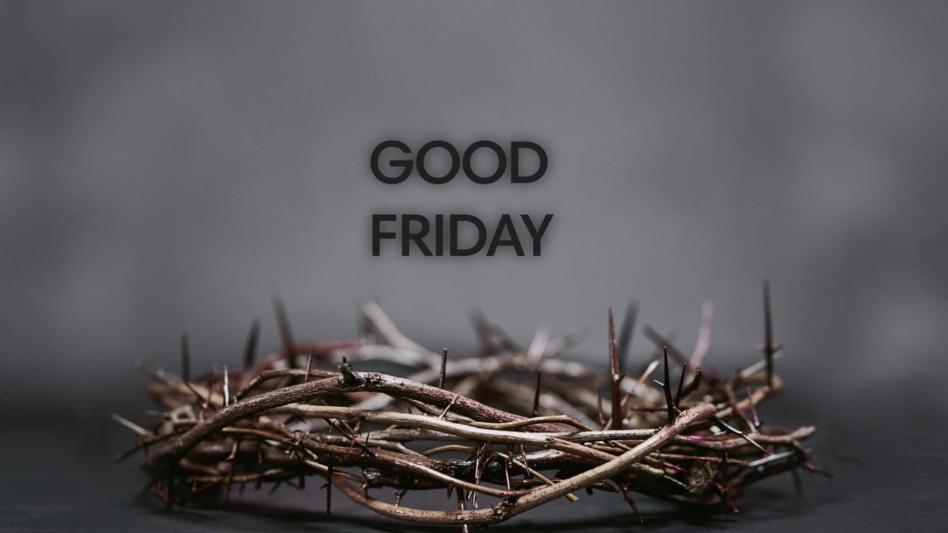 荊棘冠冕與「GOOD FRIDAY」文字，柔和灰色背景。