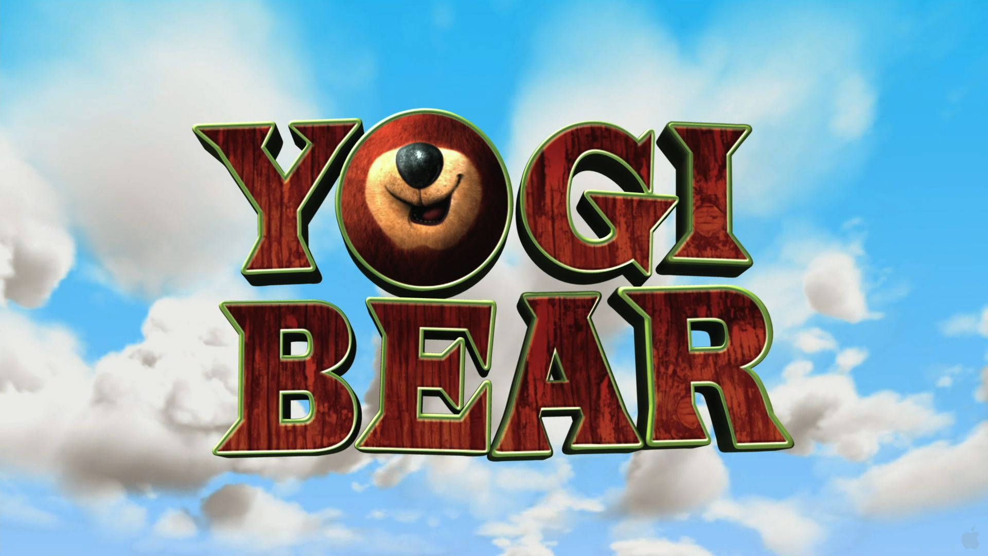 約吉熊3D電影海報 壁紙 — 標誌性的 Yogi Bear 標誌，字母 O 中有一個微笑的熊臉，背景是明亮的藍天和蓬鬆的白雲。