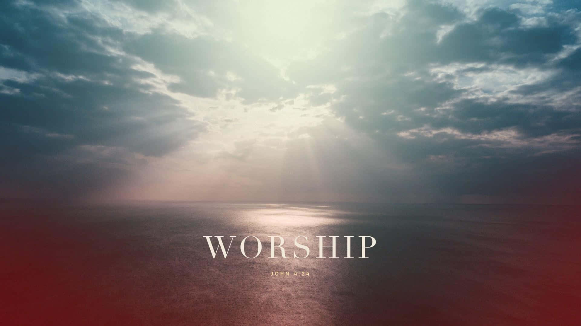 陽光穿過暴風雲層照耀海洋，帶有 worship 文字。