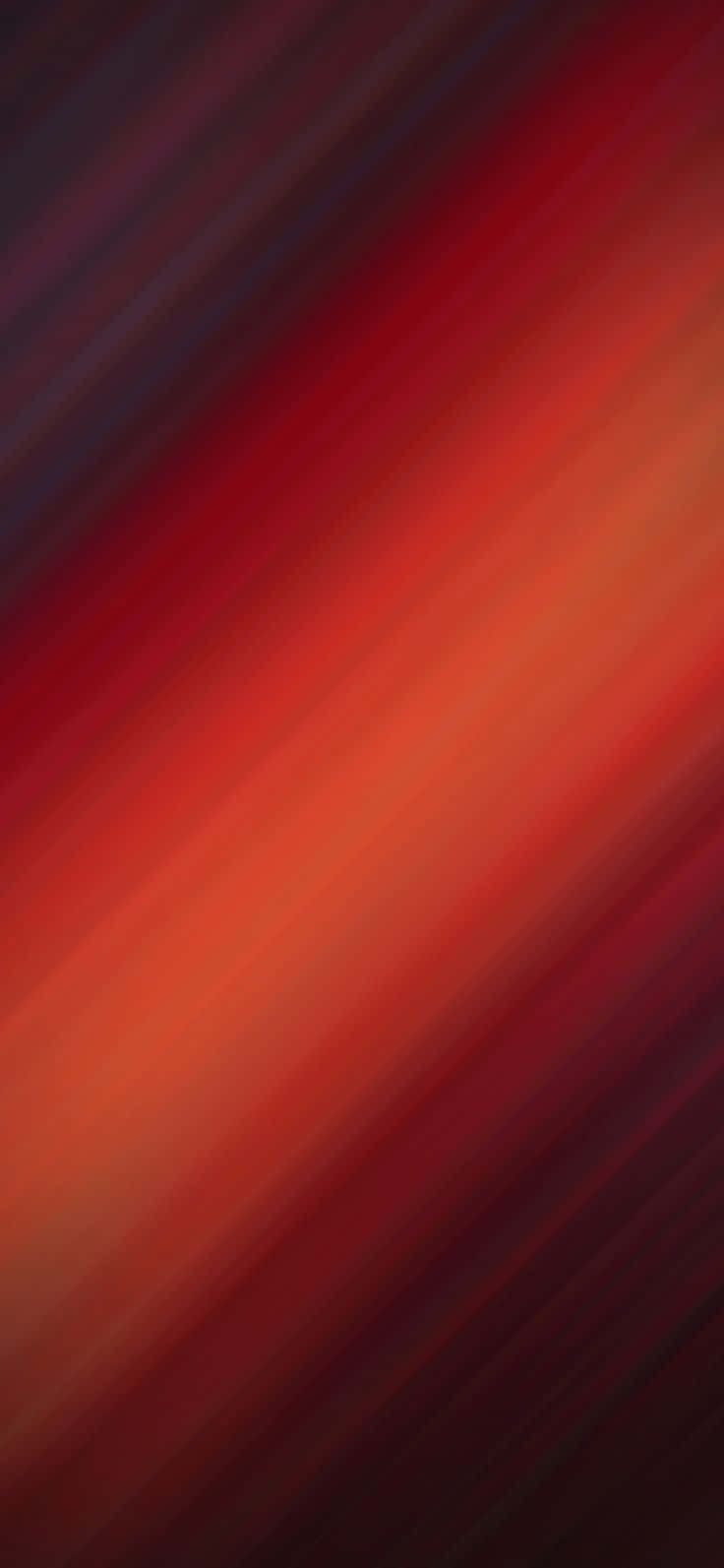 紅漸層背景 壁紙 — 充滿活力的火紅橙色和深栗色斜紋條紋，創造出動態的抽象漸變。