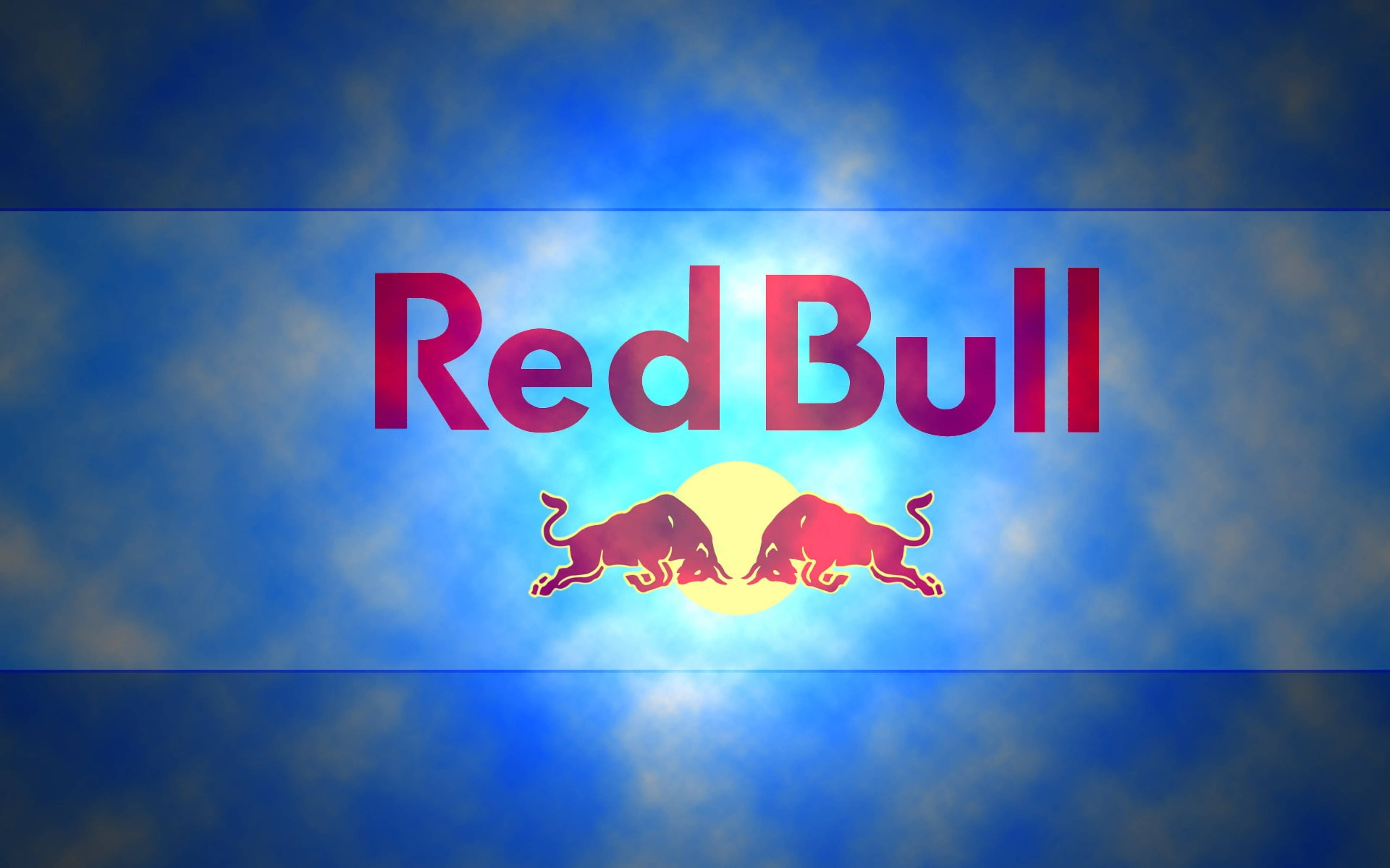 紅牛霓虹 壁紙 — Red Bull 標誌，兩頭衝鋒的公牛在充滿活力的藍天和發光的太陽背景下。
