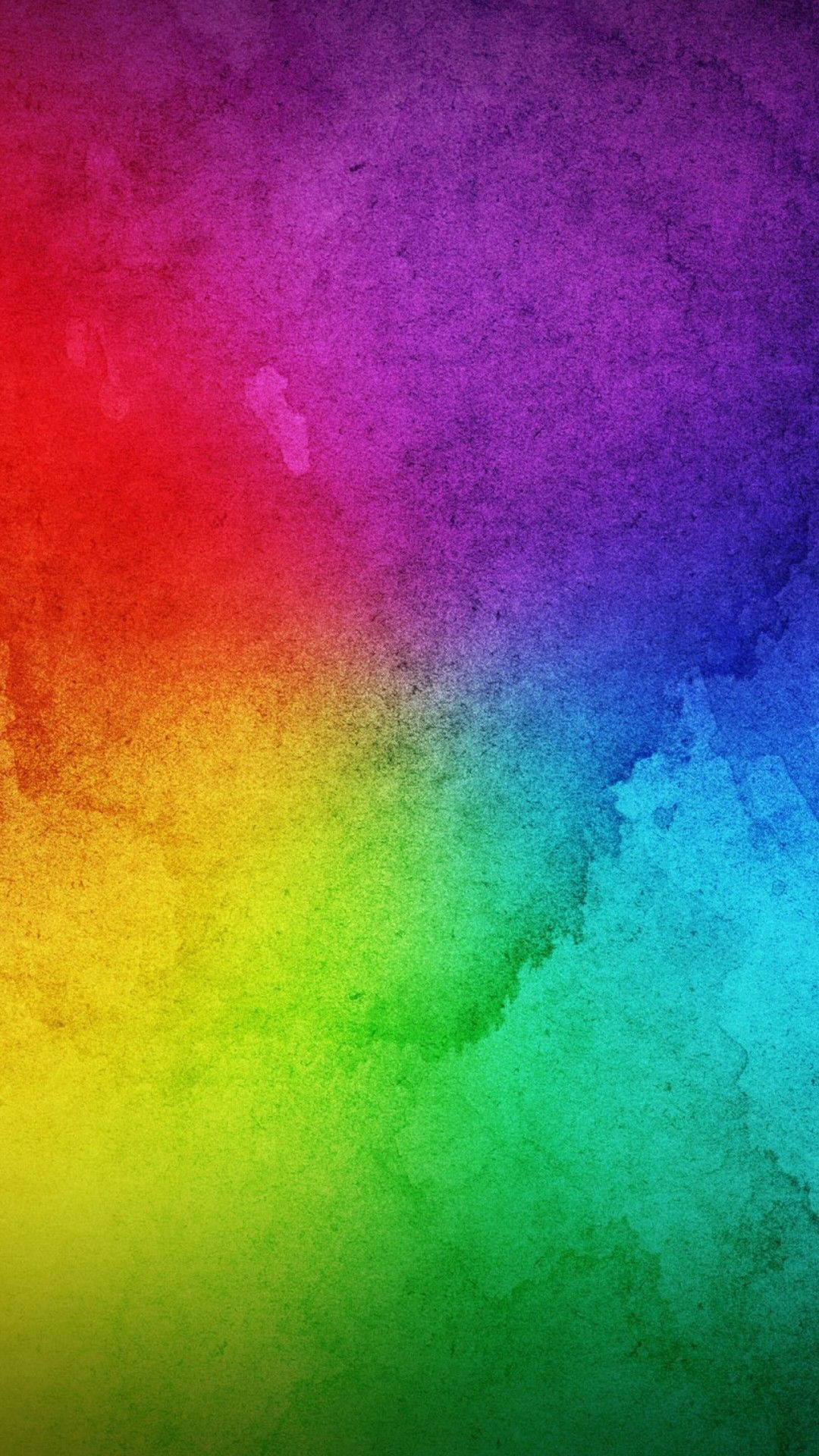 充滿活力的彩虹水彩漸變，帶有紋理筆觸。