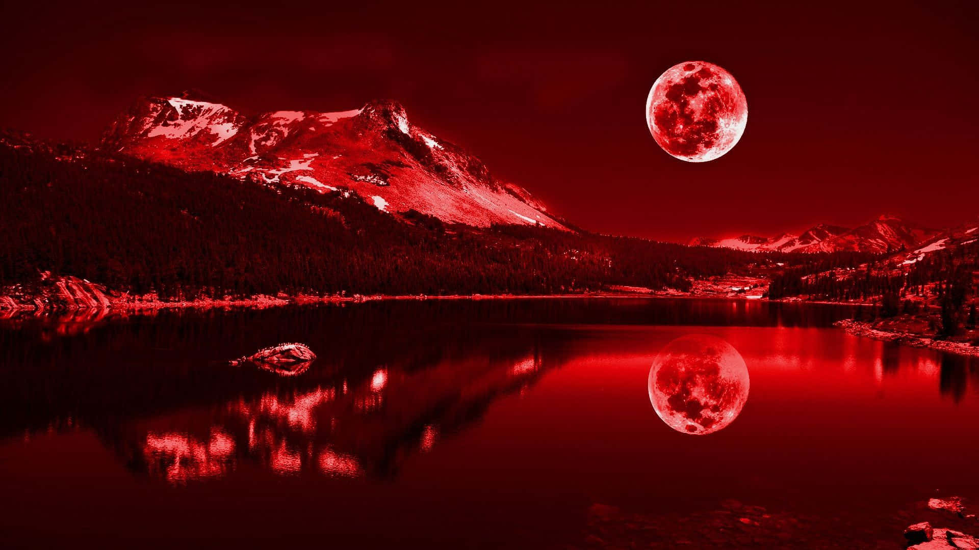 紅色 1920x1080 壁紙 — 一輪血紅色的月亮懸掛在積雪的山峰之上，倒映在深紅色天空下平靜的湖面上。