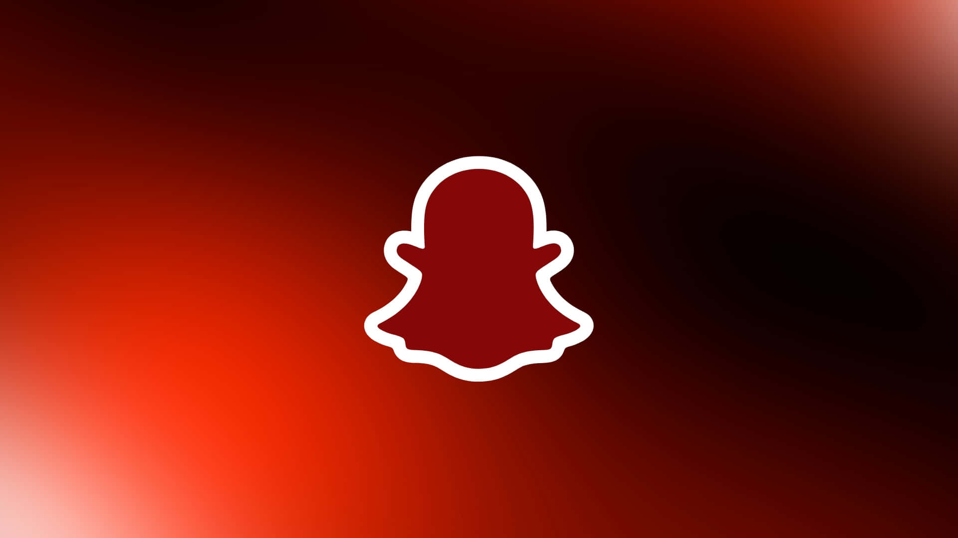 紅色 Snapchat 標誌設計 壁紙 — 白色輪廓的Snapchat鬼魂標誌居中於漸變紅色背景上，漸變至黑色。
