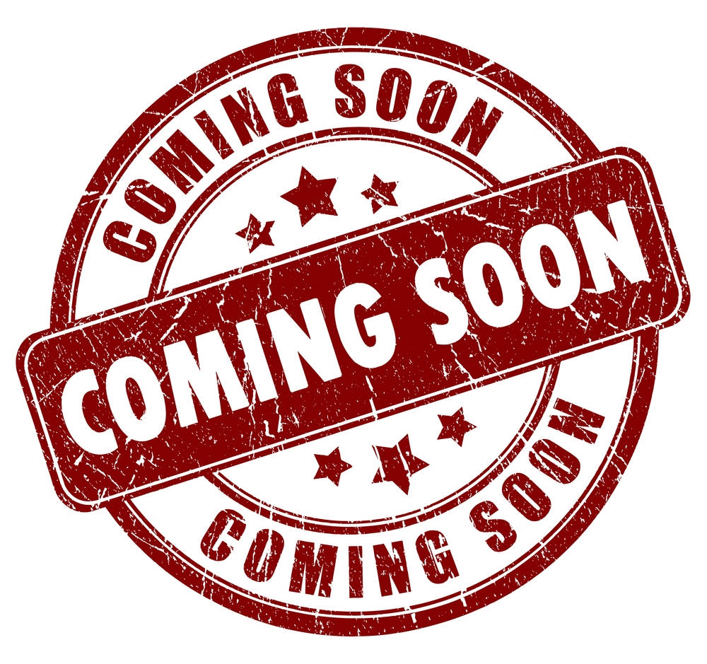 紅色復古風格「Coming Soon」印章，帶有星星和磨損紋理。