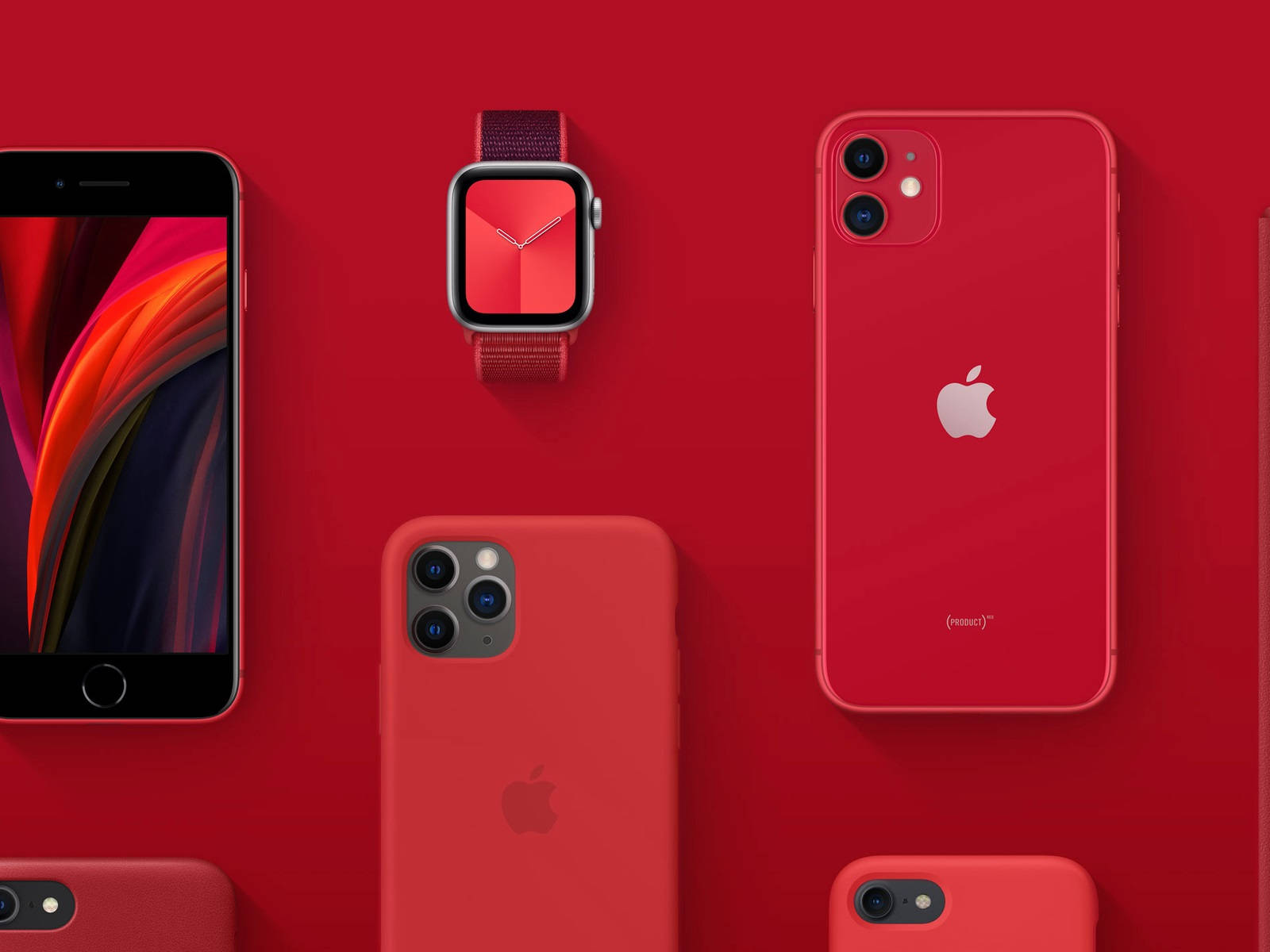 紅色Apple智慧裝置產品 壁紙 — 鮮豔的紅色Apple裝置，包括iPhone和Apple Watch，整齊地排列在純紅色背景上。
