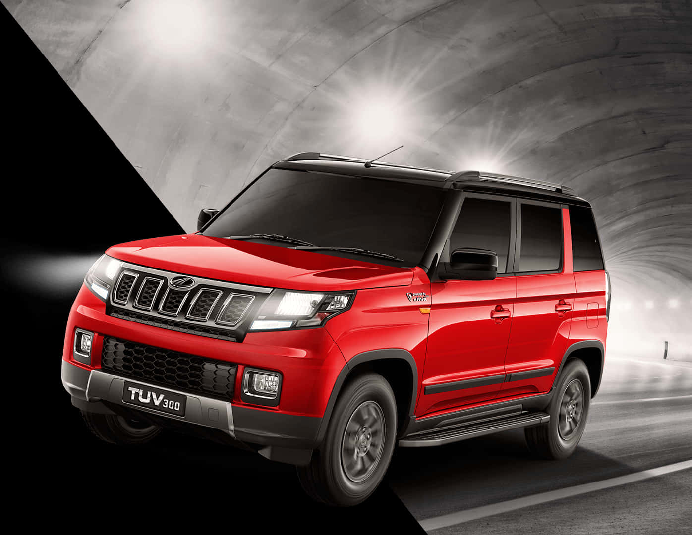 紅色Mahindra TUV300隧道駕駛 壁紙
