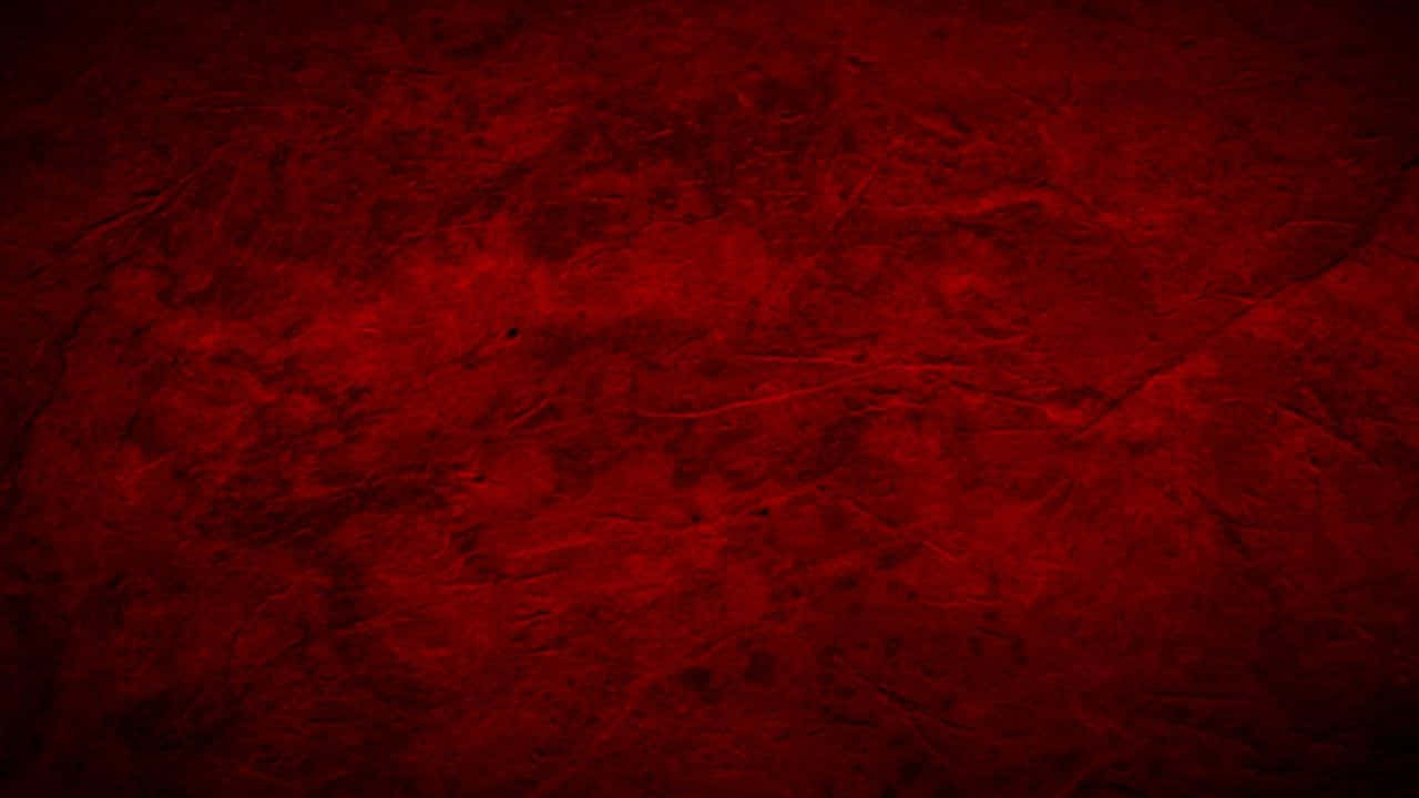 豐富紋理的紅色抽象背景，帶有細微裂紋和色調變化。