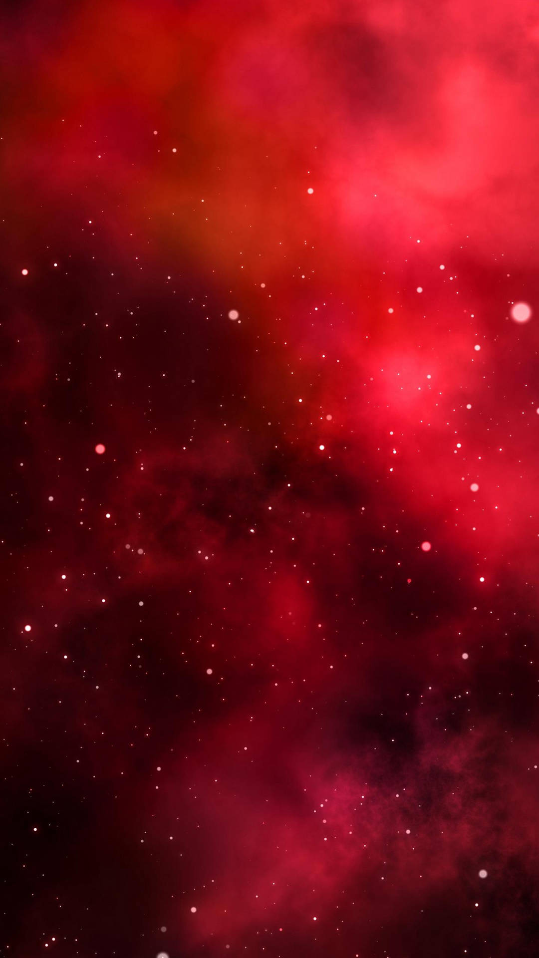 深空中充滿活力的紅色星雲與閃爍的星星。
