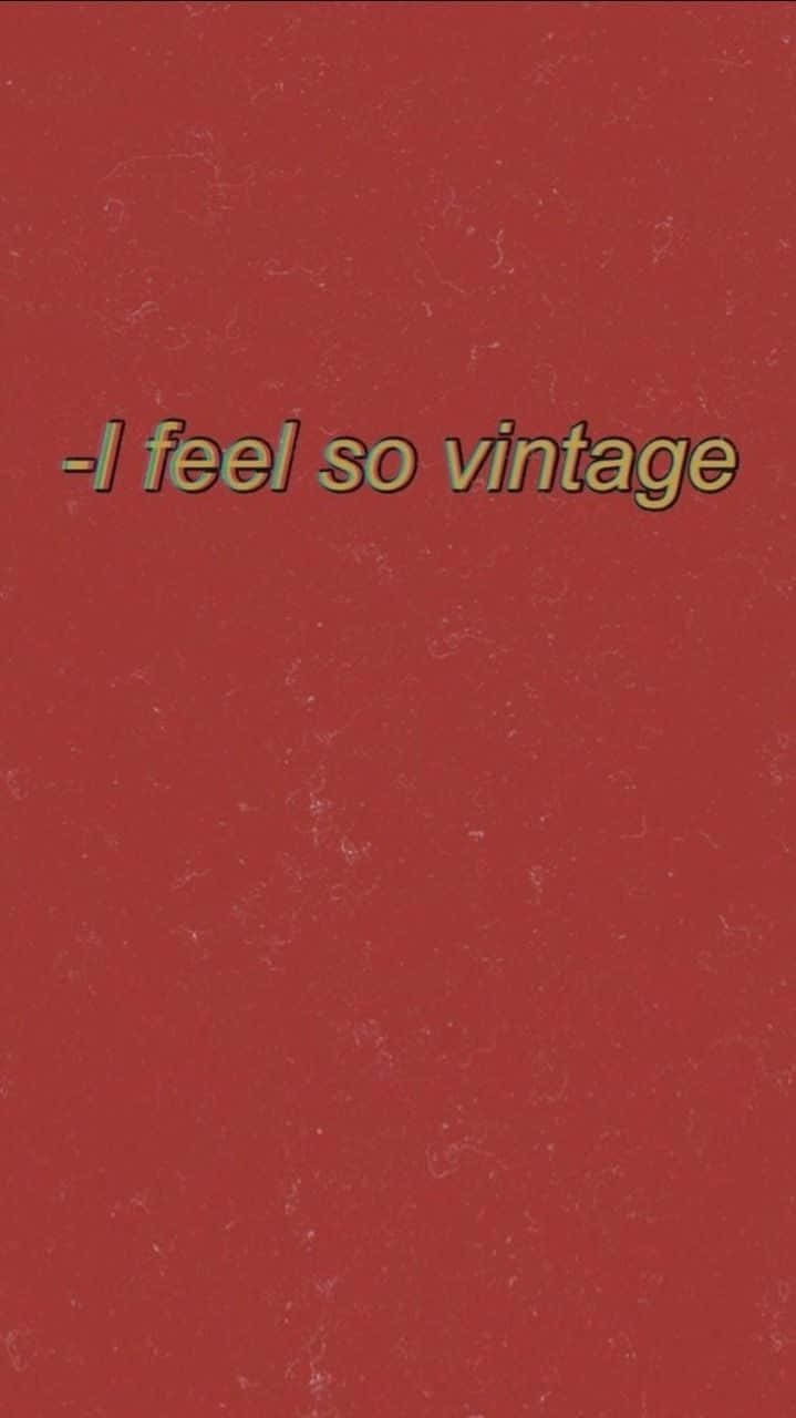 文字顯示「i feel so vintage」，背景為紋理紅色。