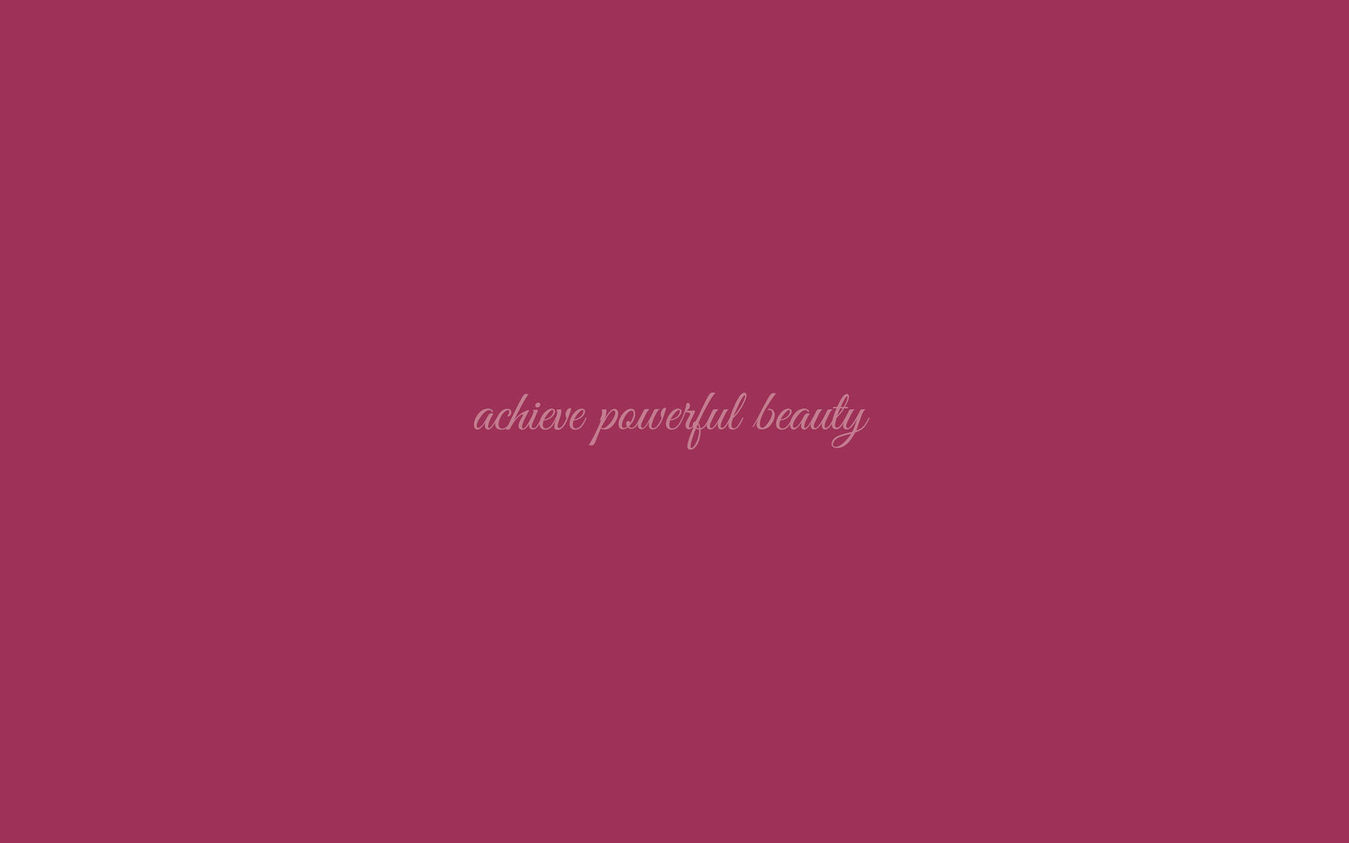 洋紅色背景中央有草書文字「achieve powerful beauty」