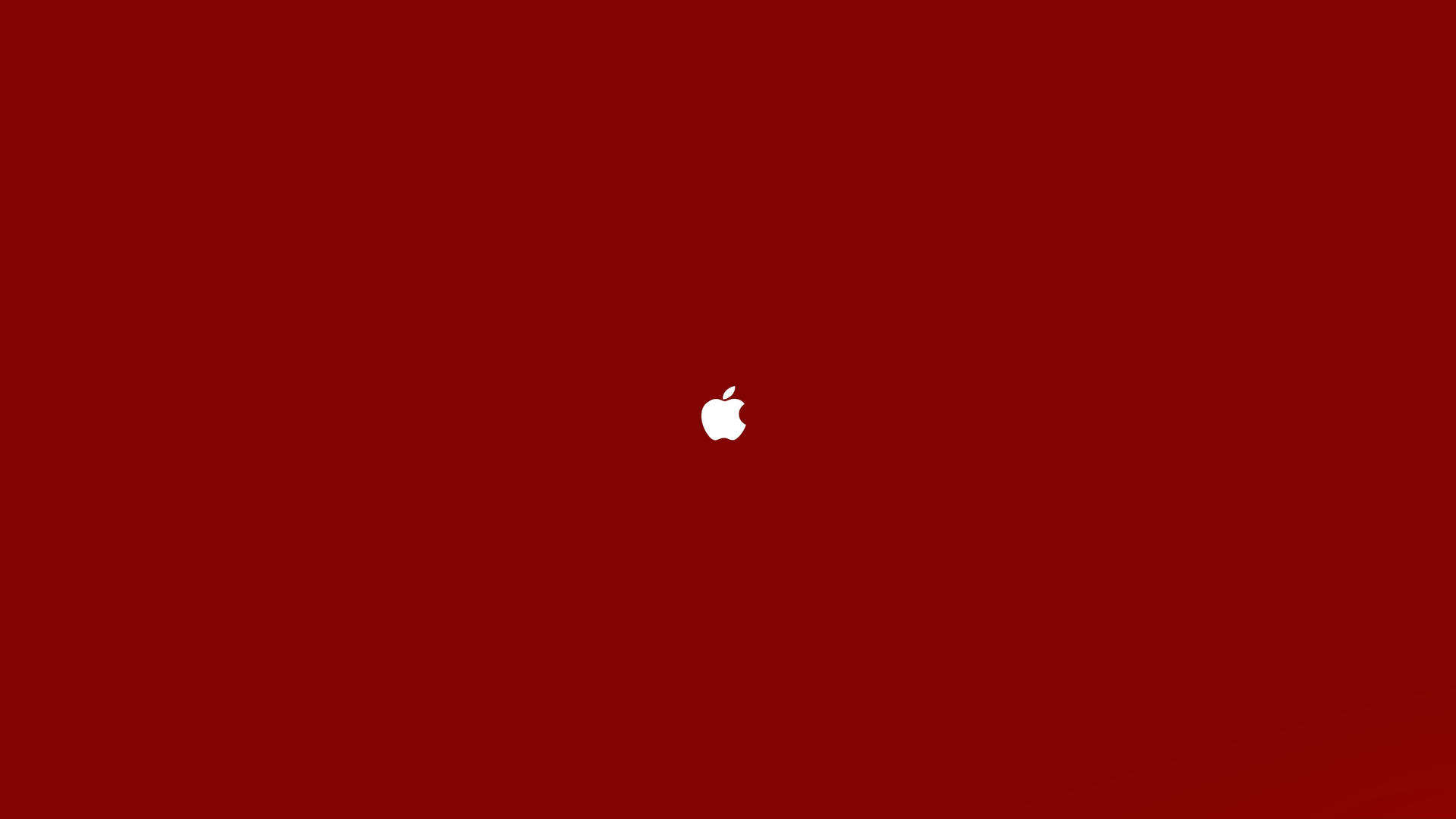 白色Apple標誌在深紅色背景上